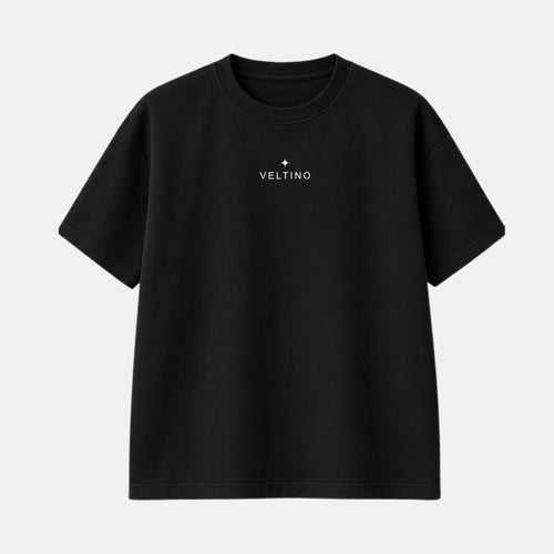 Back: Veltino oversized black terry t-shirt, back view with white text reading “Once you’ve accepted your flaws, no one can use them against you.”