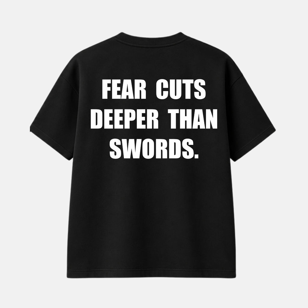 Veltino oversized black 240 GSM cotton terry t-shirt, front view with small white star logo and VELTINO wordmark on the chest