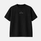 Veltino oversized black terry t-shirt, back view with large white text reading “A lion does not concern itself with the opinion of sheep”