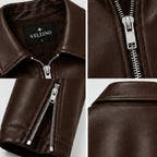 Female model styling the Veltino cropped brown leather jacket with jeans